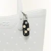 Colgante Jibbitz™ para zapatos con letra X dorada