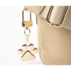 Colgante para bolso con forma de pata de perro Colgante para bolso con forma de pata de perro